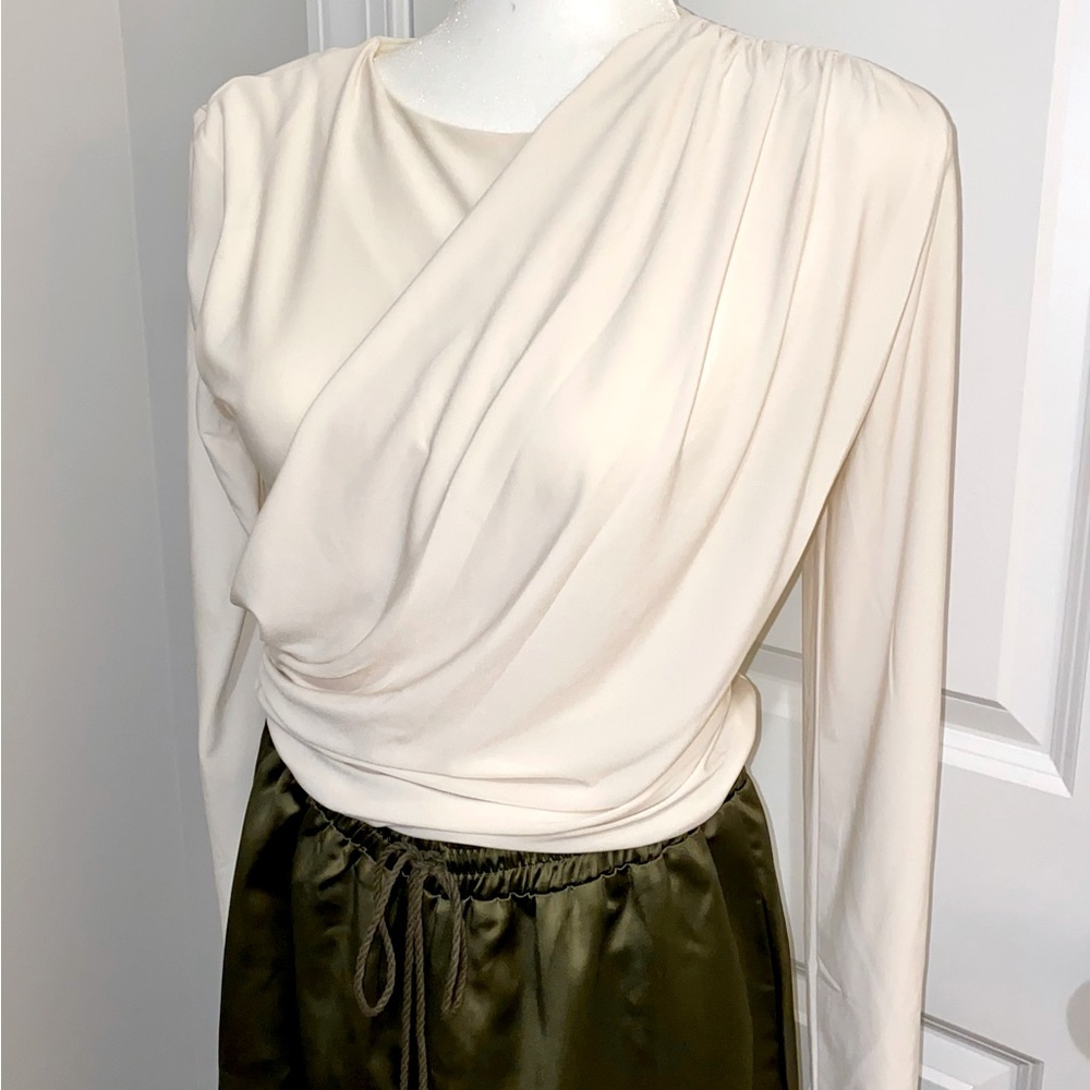 Cropped, wrap, draped, stretchy, long sleeve top from Express. Size small.